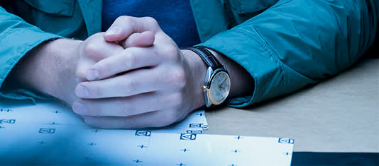 Sam Heughan wearing a Tissot PR 100 in The Spy Who Dumped Me
