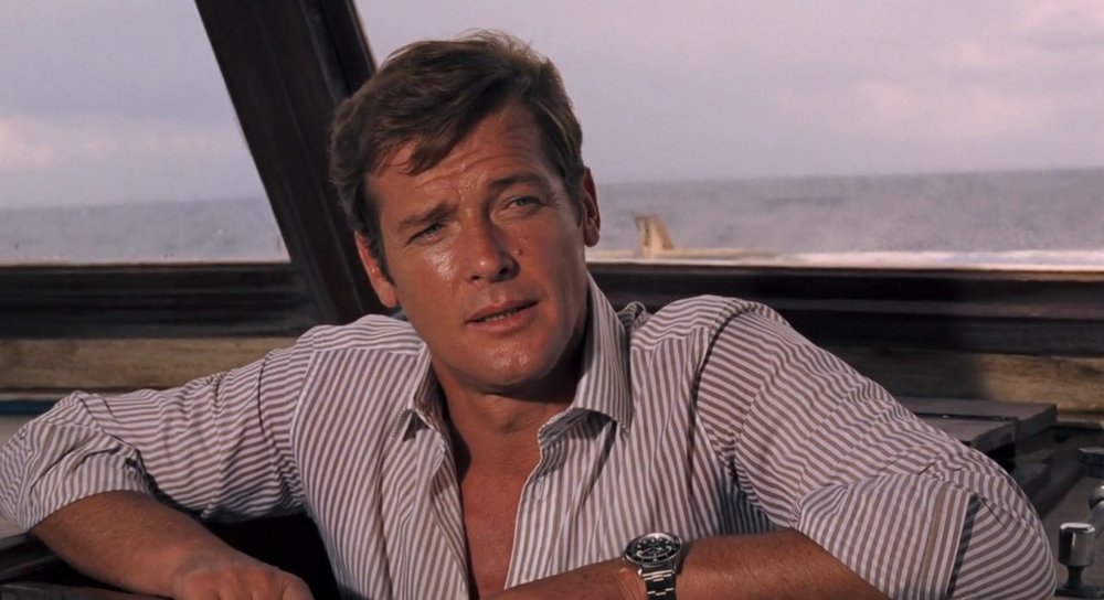 Roger Moore using the modified Rolex Submariner 5513 buzz-saw bezel in Live and Let Die