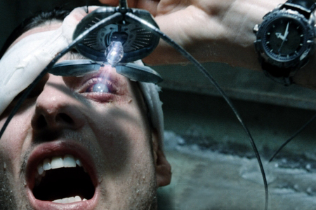 Tom Cruise as John Anderton with the Omega Speedmaster X-33 in Minority Report (2002)