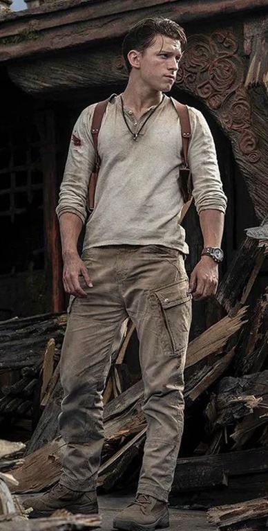 Tom Holland wearing a Fossil Coachman Chronograph CH2565 in Uncharted