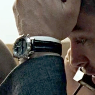 Brad Pitt as David Mills with the Sharper Image World Timer in Se7en (1995)