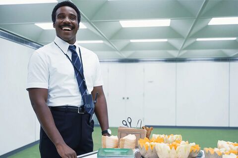Tramell Tillman as Seth Milchick with the Bijouone B001 in Severance (2022)