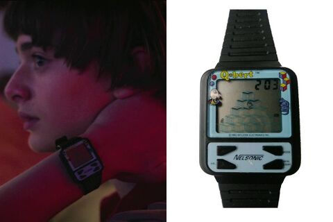 Noah Schnapp as Will Byers with the Qbert Nelsonic Game Watch in Stranger Things (2016)