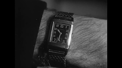 John Mills as Commandant Fraser with the Jaeger-LeCoultre Reverso in Above Us the Waves (1955)