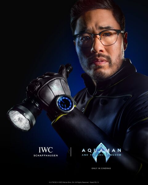 Randall Park as Dr. Stephen Shin with the IWC XPL prop watch in Aquaman and the Lost Kingdom (2023)