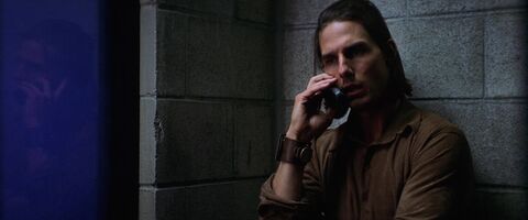Tom Cruise as Frank T.J. Mackey with the Timex Expedition in Magnolia (1999)