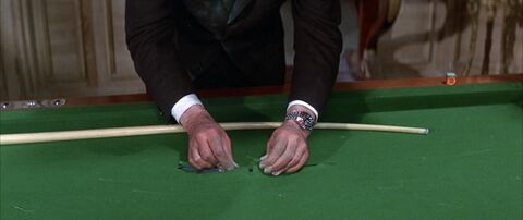 Peter Sellers as Jacques Clouseau with the Rolex GMT-Master 1675 in A Shot in the Dark (1964)