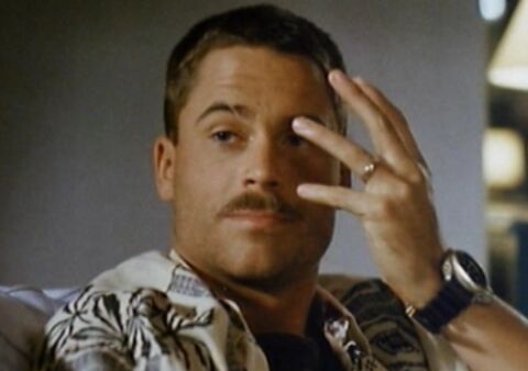 Rob Lowe as Lawrence Hammer with the Citizen Aqualand in The Finest Hour (1992)