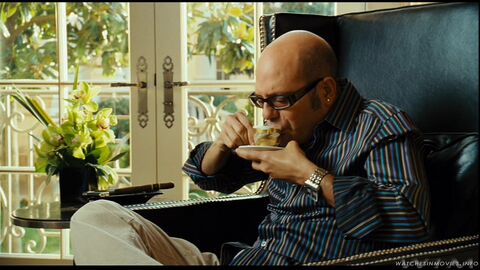 David Cross as Ian Hawke with the TAG Heuer Monaco in Alvin and the Chipmunks (2007)