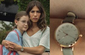 Round gold watch green strap