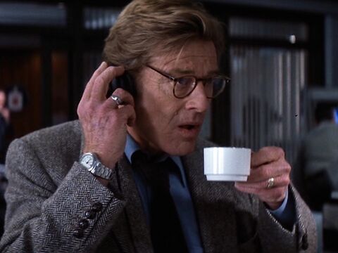 Robert Redford as Nathan Muir with the Victorinox Swiss Army Officer's 1884 in Spy Game (2001)