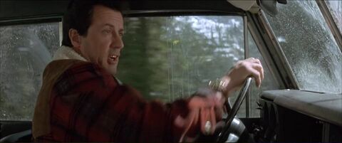 Sylvester Stallone as Gabe Walker with the Hamilton Khaki in Cliffhanger (1993)