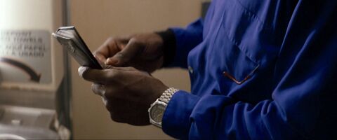 Wesley Snipes as John Cutter with the Armitron watch in Passenger 57 (1992)