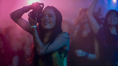 Chase Sui Wonders as Samantha 'Sam' with the Casio LA11WL-7A in City on Fire (2023)