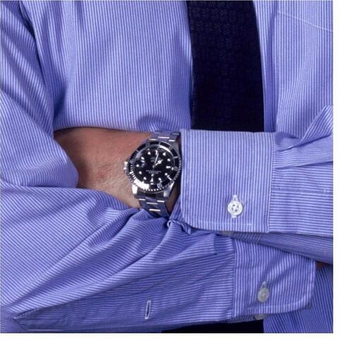 Rob Lowe as Sam Seaborn with the Rolex Submariner Date in The West Wing (1999)