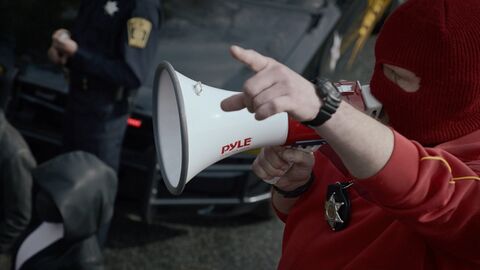 Andrew Howard as Red Scare with the Casio (unidentified model) in Watchmen (2019)