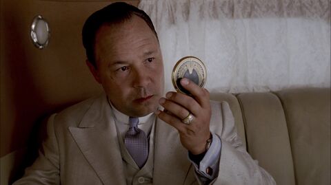 Stephen Graham as Al Capone with the Elgin silver tonneau watch in Boardwalk Empire (2010)