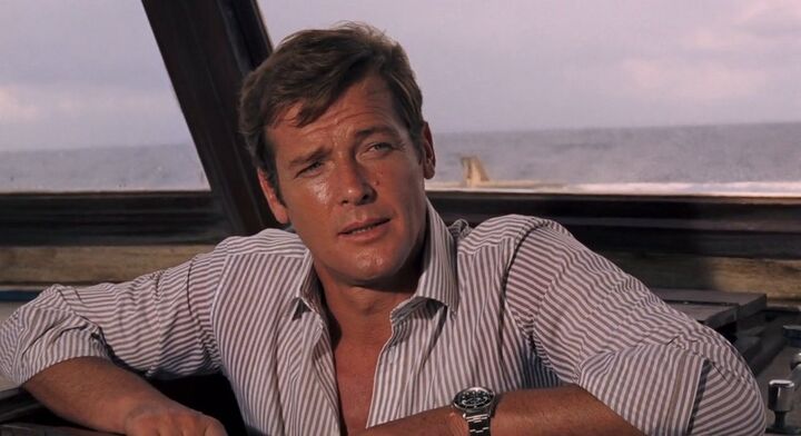 Roger Moore using a toothed rotating Rolex Submariner bezel to cut rope in Live and Let Die