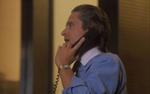 Charlie Sheen as Bud Fox with the Cartier Panthere de Cartier in Wall Street (1987)