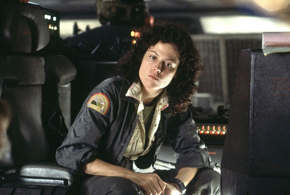 Sigourney Weaver wearing two Casio F-100 modules on a single black carrier in Alien