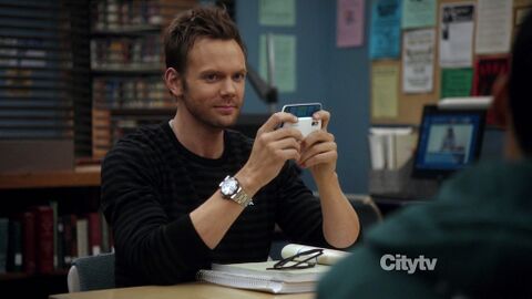 Joel McHale as Jeff Winger with the Concord C1 in Community (2009)