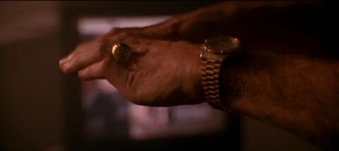 Bruce Willis as John McClane with the TAG Heuer 2000 Professional in Die Hard 2 (1990)