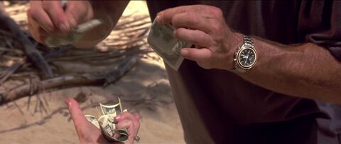 Harrison Ford as Quinn Harris with the Omega Speedmaster 3520.50 in Six Days, Seven Nights (1998)