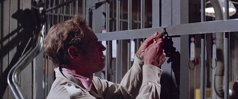Charlton Heston as Robert Neville with the Omega (unidentified model) in The Omega Man (1971)