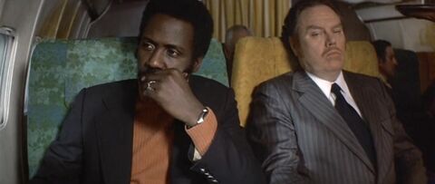 Richard Roundtree as John Shaft with the Seiko (unidentified model) in Shaft in Africa (1973)