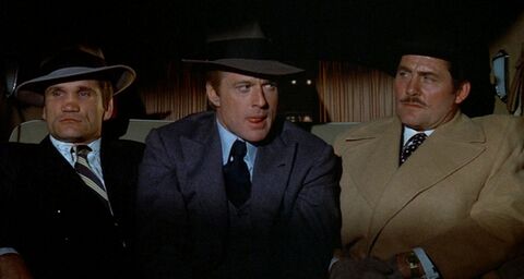 Robert Shaw as Doyle Lonnegan with the Unidentified watch in The Sting (1973)