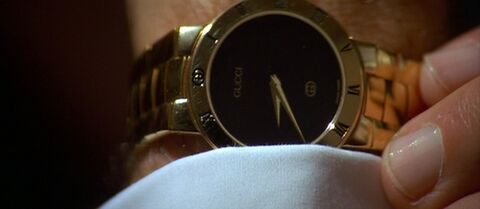 Harvey Keitel as Winston "The Wolf" Wolfe with the Gucci 3000.2.M in Pulp Fiction (1994)