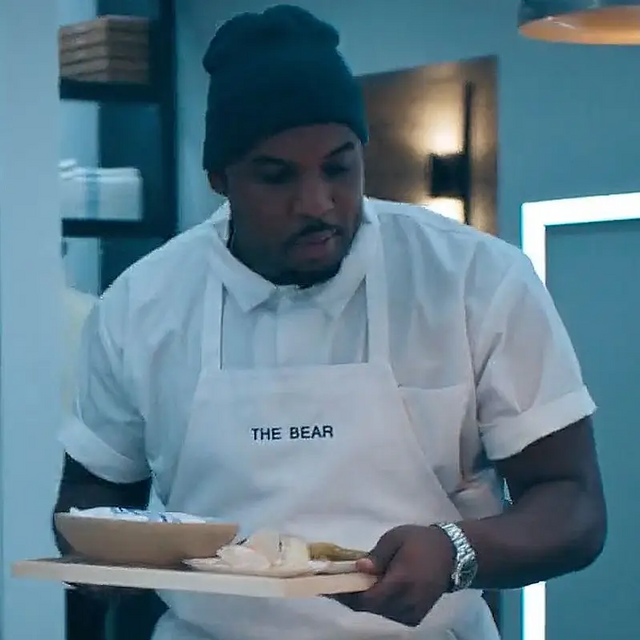 Lionel Boyceas Marcus Brooks with the Tissot Gentleman Powermatic 80 in The Bear (2022)