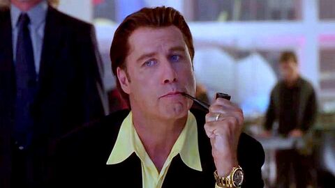 John Travolta as Howard Saint with the Rolex Submariner in The Punisher (2004)