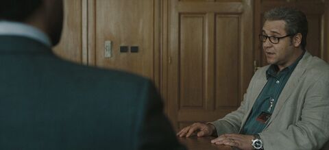 Russell Crowe as Ed Hoffman with the Breitling Emergency in Body of Lies (2008)