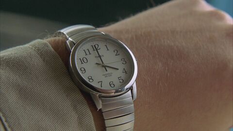 Michael Emerson as Ben Linus with the Timex Easy Reader in Lost (2004)