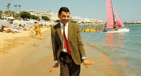 Rowan Atkinson as Mr. Bean with the Casio DBC-610 in Mr. Bean's Holiday (2007)