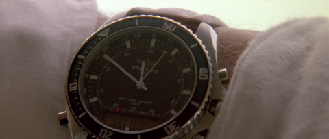 Patrick Swayze as Bodhi with the Breitling Navitimer Pluton in Point Break (1991)