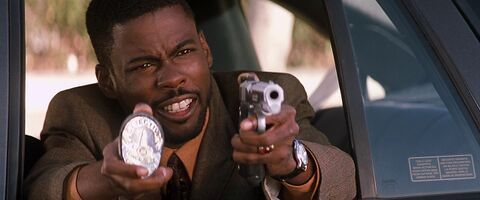 Chris Rock as Lee Butters with the Hamilton Linwood Viewmatic in Lethal Weapon 4 (1998)