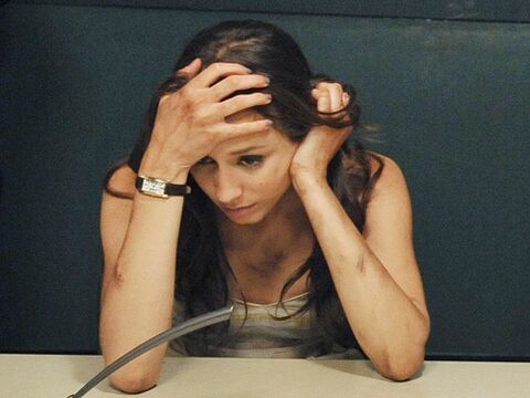 Troian Bellisario as Spencer Hastings with the Cartier Tank Américaine in Pretty Little Liars (2010)