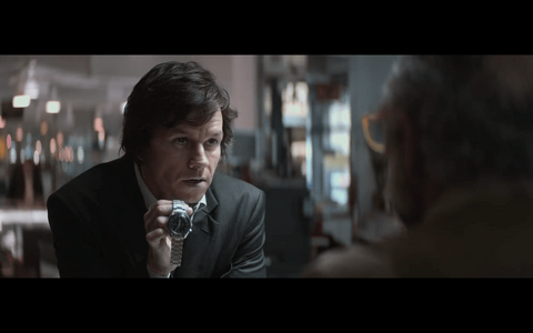 Mark Wahlberg as Jim Bennett with the Omega Speedmaster (unidentified model) in The Gambler (2014)