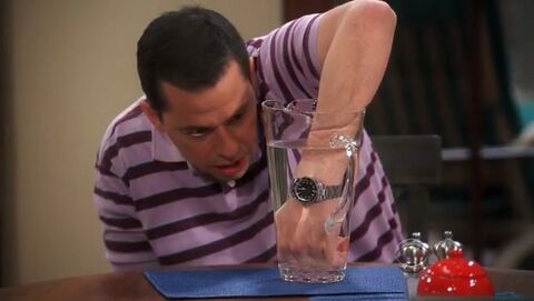 Jon Cryer as Alan Harper with the Rolex Submariner in Two and a Half Men (2003)