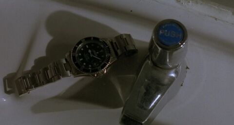 Lau Ching-Wan as Inspector Shek Wai-ho with the Rolex Submariner in Black Mask (1996)