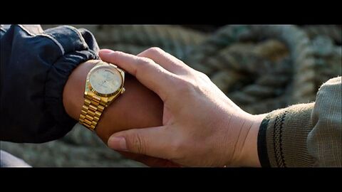 Kim Yoon-seok as Kang Chul-joo with the Rolex (fake) in Sea Fog (2014)