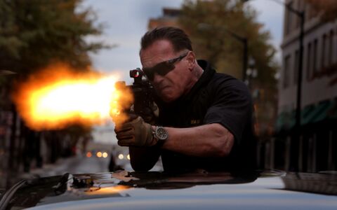 Arnold Schwarzenegger as Breacher with the MTM Special Ops Patriot in Sabotage (2014)
