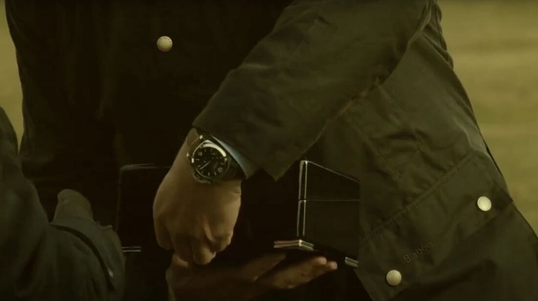 Close view of Tom’s wrist beside an open presentation box.