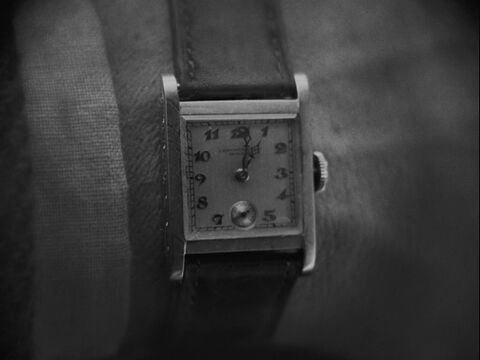 Alfred Abel as Joh Fredersen with the Movado (unidentified model) in Metropolis (1927)