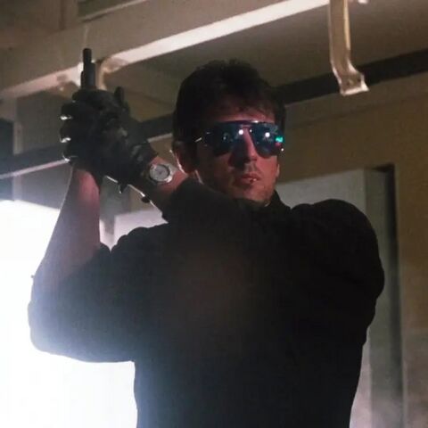 Sylvester Stallone as Marion Cobretti with the TAG Heuer 2000 Professional in Cobra (1986)