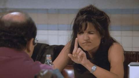 Julia Louis-Dreyfus as Elaine Benes with the Cartier Santos in Seinfeld (1989)