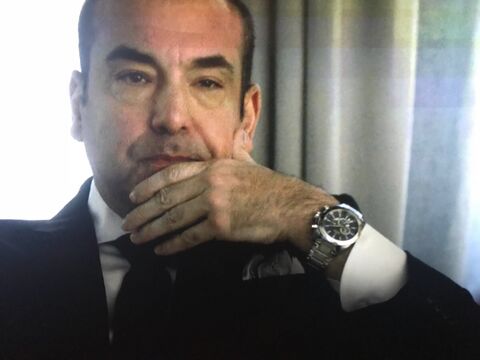Rick Hoffman as Louis Litt with the Festina (unidentified model) in Suits (2011)