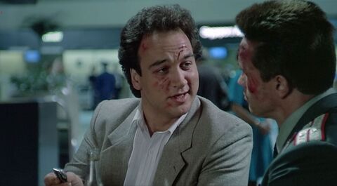 Jim Belushi as Art Ridzik with the Rolex Day-Date in Red Heat (1988)